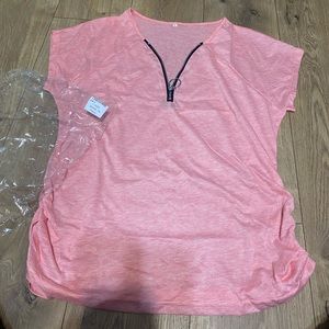 Women’s pink top size XL. Still in packaging. Didn’t come with tags.